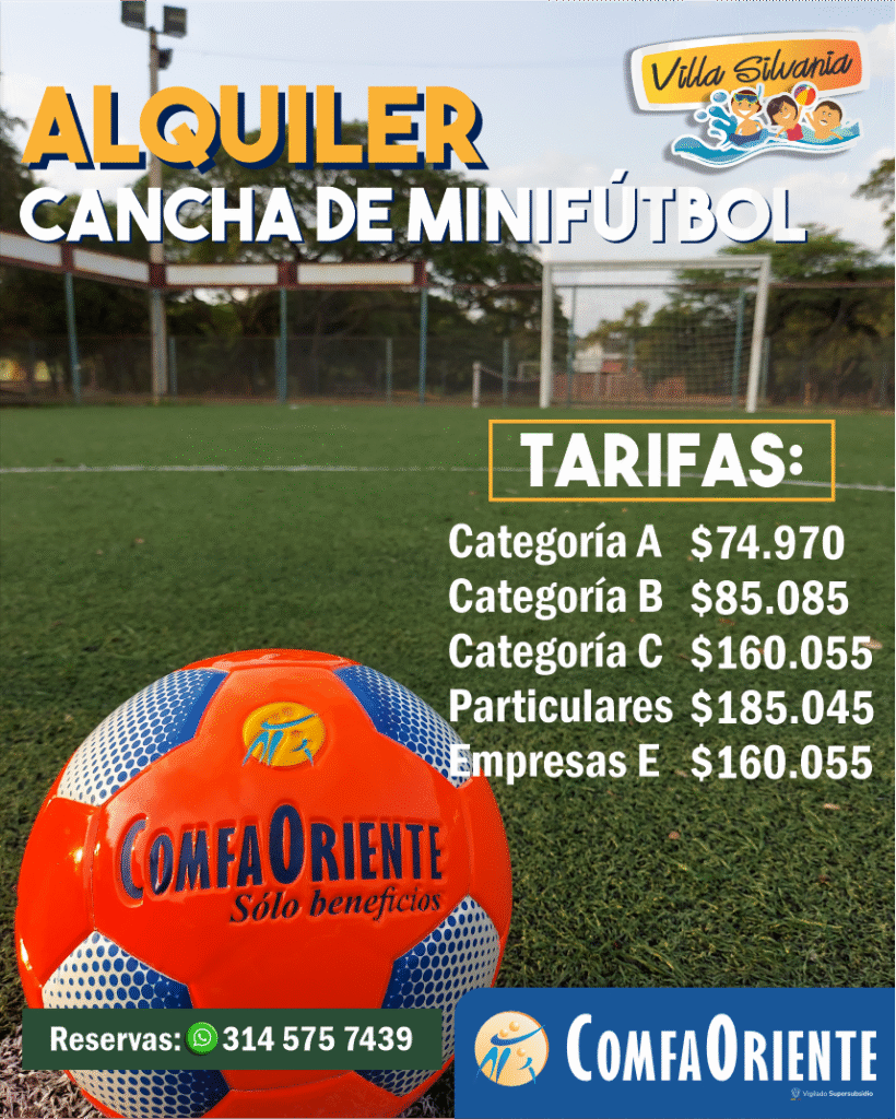 Pelota naranja y azul con logo ComfaOriente sobre césped artificial frente a una portería; cartel anuncia alquiler de cancha de minifútbol, tarifas y contacto.